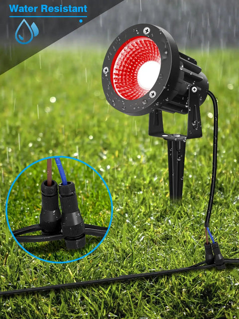 Fastlock Outdoor Low Voltage Landscape Light Connectors 16 Pack with red spotlight on grass, water-resistant feature