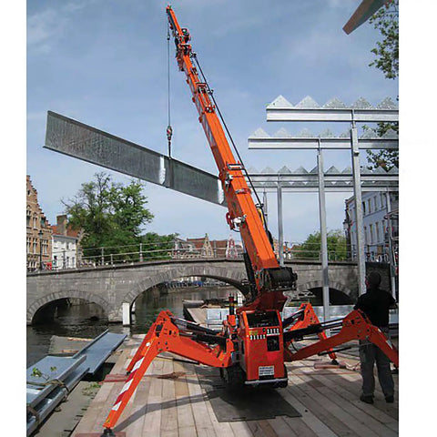 Mini Portable Crawler Crane Rig With Smart Wireless Remote Hydraulic Lift Machine Fully Kitted Out lifting steel beams over a canal.