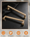 Two champagne bronze cabinet pulls shown on black fabric, part of 10 Pack Champagne Bronze Cabinet Pulls 5 Inch 128mm Hole Center Dresser Drawer Handles For Kitchen Cabinets Cupboards And Bathrooms Sick Upgrade Durable Hardware For Cabinets And Vanities