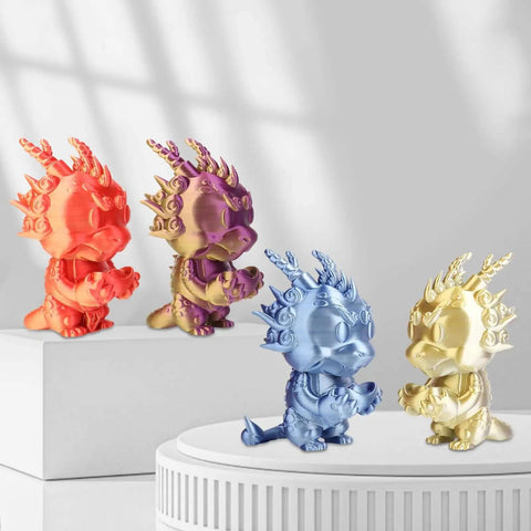Colorful dragon figurines 3D printed with Dope Silk PLA Filament 1.75mm Blue Silver Dual Color Coextrusion For 3D Printers.