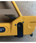Close-up of Professional Pneumatic Nail Gun compatible with 7116 staples showing yellow body and grip lever.