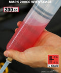 200Cc No Sweat Fluid Extractor Pump With Hella Long Flexible Silicone Hose And Twin Extension Tubes measurement display in hand