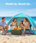 Family using Large Beach Tent Sun Shelter For Three To Four People With UPF 50 Plus UV Protection Privacy Door on sandy beach