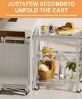 Slick Stainless Steel Folding Kitchen Cart Rock Solid Three Tier Rolling Utility Station With Grippy Locking Wheels, foldable with food prep.