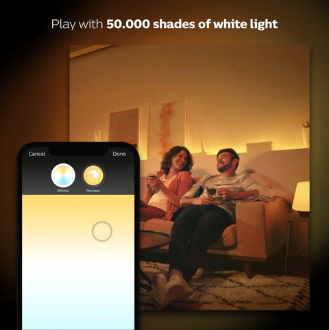 Couple enjoying mood lighting from A19 smart bulb, app controls visible. Get Your Hands On This Awesome A19 Smart Bulb That Gives You 16 Million Colors To Light Up Any Lamp Or Overhead Light Just Right Needs A Smart Hub To Work And Plays Nice With Alexa For Hands Free Voice Control This Is The Older Version But Still Kicks.