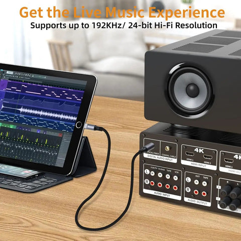 No Hassle Plug And Play Usb C Toslink Optical Audio Cable For Crisp Digital Sound Transfer Across Phones Laptops Smart Tvs And Home Theater Gear With Lossless Stereo Cord Four Feet Long connected to a tablet and speaker.
