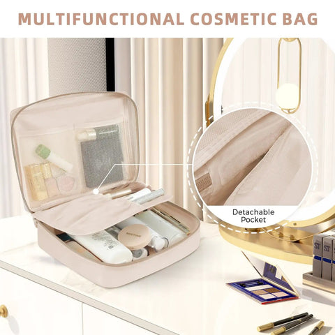Multifunctional cream cosmetic bag with detachable pocket, open to display organized skincare products and makeup items on table.
