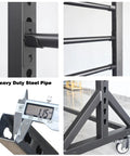 Badass Heavy Duty Steel Storage Rack Built Different For Garage Organization Setup That Easily Handles Vinyl Rolls Wallpaper Transfer Paper And Tape Dispensing With Zero Sagging Problems close-up of steel pipe and welded frame details