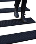 Person walking on Grippy Rubber Stair Treads Non Slip Outdoor 35x10 Inches 5 Pack Anti Slip Step Mats