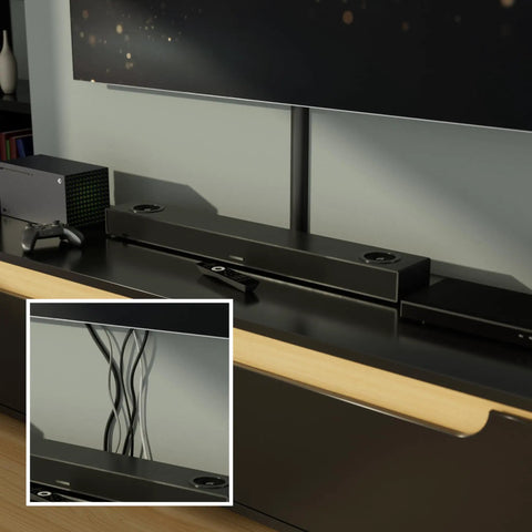 Black TV Wire Hider Cord Cover for Wall Mount TV Half Round Cable Raceway beside TV with wires managed