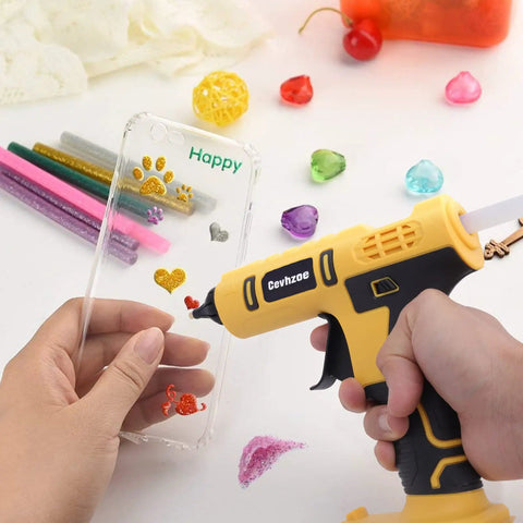 Cordless Hot Glue Gun Kit Powered By A 20V Battery Includes 20 Glue Sticks 0.43 Inch And Insulated Copper Nozzle in use on phone case