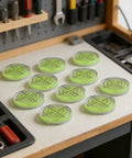 Circular for spirit Level 32mm High Translucent for acrylic Body on a workbench, showcasing multiple levels in a tool setting.