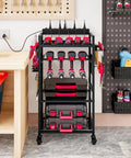 Power Tool Organizer Cart With Charging Station On Wheels For Heavy Duty Garage Use Rolling Tool Storage Cart For Drills Batteries Bits And Accessories Neat Workbench Shelving Unit For Grab And Go Access in a garage setting