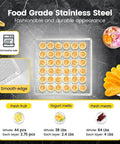 Heavy Hitter Commercial Food Dehydrator With 16 Stainless Steel Trays And 1500 Watts showcasing dried fruits on a smooth stainless steel tray.