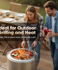 People using Smokeless Wood Burning Stove 19.5 Inch Stainless Steel Portable Outdoor Heater For Wood Charcoal And Pellet Fuel in backyard.