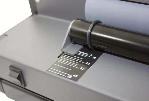 Close-up of All-In-One Coil Punch, Electric Inserter and Electric Coil Crimper with oval holes, showing sheet capacity guide.
