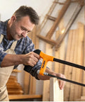 Man using hacksaw from 119 Piece Home Tool Set With Plastic Storage Toolbox For All Purpose Household Repairs And DIY Projects.