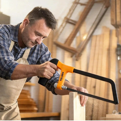 Man using hacksaw from 119 Piece Home Tool Set With Plastic Storage Toolbox For All Purpose Household Repairs And DIY Projects.