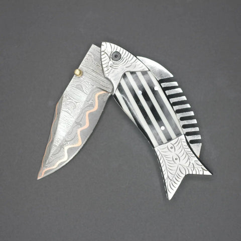 Fish Style Damascus Folding Knife With Ladder Pattern Blade Copper Finish Brass Engraved Handle And Leather Sheath displayed open