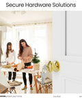 Matte Black Door Knob With Lock And Key installed on white door, family wrapping gifts in bright kitchen.