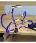 Five Arm Soldering Station With Magnifier LED Light Bench Vise Table Clamp And Third Helping Hand For PCB Work on desk.