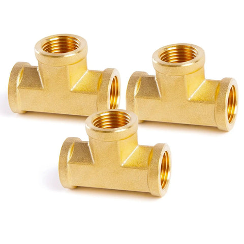 Three Brass 1/2 inch NPT female tee fittings for home plumbing, angled view showing threads and ports, corrosion-resistant design.