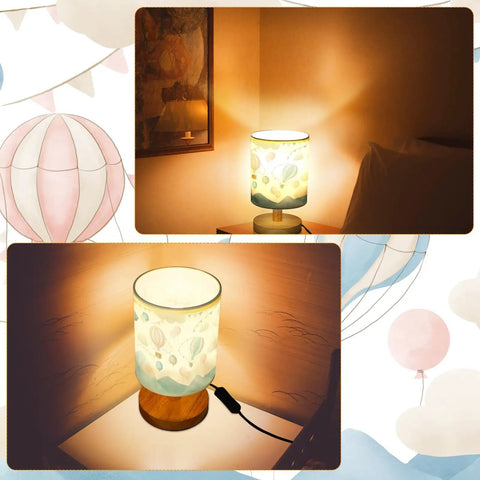 Hot Air Balloon Kids Table Lamp with linen shade and wood base, glowing on bedroom nightstand, kid-friendly cartoon nursery light.