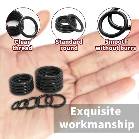 Hand holding O rings from Two Box O Ring Set With 510 Pieces Total 18 Size Metric NBR Rubber Gasket Sealing Kit For Plumbing Faucets Automotive Air Or Gas Systems Versatile Assortment For Repairs And DIY Projects.