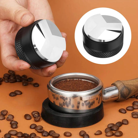 All In One 7 Piece Espresso Accessories Kit For Home Baristas Includes 54mm Espresso Tamper in use with coffee beans close-up