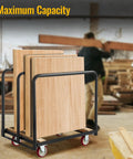 Heavy Duty Steel Panel Truck Cart Built To Haul 1000 Lbs With Four Swivel Casters Wood End And Three Side Handrails For Easy Moving And Reliable Load Transport. steel cart holding wood panels in workshop