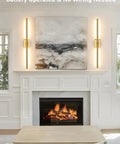 Slick Wireless Rechargeable Wall Sconces Set Of 2 Battery Powered Gold Light Fixtures mounted beside artwork in living room.