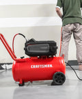 No Nonsense 10 Gallon Electric Air Compressor With Wheels 175 Psi Max Push 1 8 Hp Oil Free Motor Dead Quiet setup in garage setting.