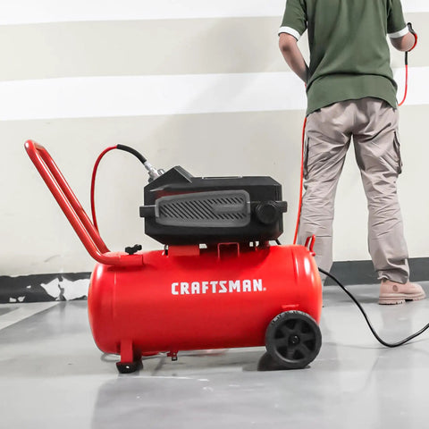 No Nonsense 10 Gallon Electric Air Compressor With Wheels 175 Psi Max Push 1 8 Hp Oil Free Motor Dead Quiet setup in garage setting.
