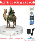 Foxvee Motorized Electric Turntable Remote Controlled Rotating Display Stand Speed Adjustable 360 Degree Photography Platform For 3d Scan Showcase And Multi Mode Video With White Finish with camel figurine and remote control.
