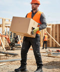 Worker at construction site wearing Mens Steel Toe Work Boots Waterproof Safety Shoes For Job Sites, Rugged All Day Comfort