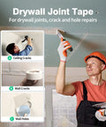 Worker using drywall knife with Fiberglass Mesh Drywall Tape For Quick Crack Repair Self Adhesive 1.97 Inch By 150 Foot.