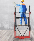 Worker using Electric Scaffolding System with Remote Control Wheels, Multifunctional Cargo Elevator and Climbing Working Platform indoors.