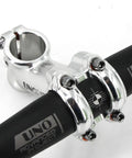 Close-up of glossy silver 35 Degree 90mm 31.8 Stem Riser for Mountain Road and BMX rigs with 31.8mm clamp on handlebars.