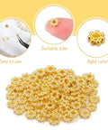 Close-up of gold flower spacer beads from 800 Pcs 6mm Flower Spacer Beads Multicolor Daisy Flower Metal Alloy Spacers Jewelry Kit.