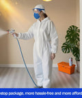 Person in protective gear using No Fuss Airless Paint Sprayer Kit With 25 Ft Hose And Three Reversible Tips for wall coverage.