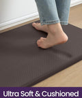 Person standing on Extra Long Anti Fatigue Kitchen Mat Cushioned Memory Foam Runner Rug 70 By 20 Inches Waterproof Non Slip Backing