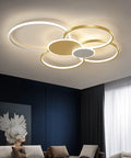 LED Ceiling Light With Four Ring Chandelier Design, Slick Modern Flush Mount Fixture, in living room with gold and white finish.