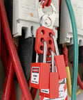 Lockout Tagout Kit For Electrical Safety With Group Hasps, Lockout Tags, 2 Keyed Different Padlocks securing electrical panel.