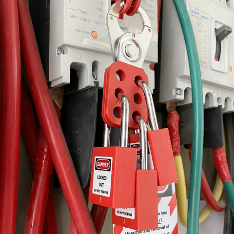 Lockout Tagout Kit For Electrical Safety With Group Hasps, Lockout Tags, 2 Keyed Different Padlocks securing electrical panel.