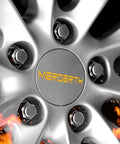 Close-up of chrome wheel with Set Of 20 12x1.5 Radius Ball Seat Lug Nuts With Washer Chrome Finish for Civic S2000 CRZ DX LX EX.