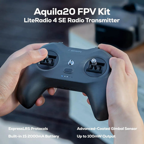 Hands holding LiteRadio 4 SE from Aquila20 FPV Kit with dual gimbals and controls, suitable for indoor outdoor flying.