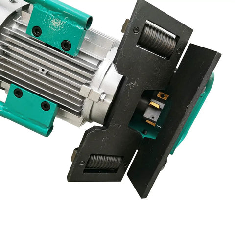 Portable Electric Beveling Machine Rolls In Easy To Bang Out Clean 30 To 60 Degree Plate Edges For Flawless Weld Prep With Rugged Cast Iron Rollers Built Tough - Close-up of motor and rollers.