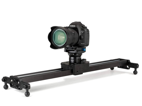 Smooth Camera Leveling Base For Universal Tripods And Video Heads Featuring Easy Turn Dial And Secure Lock Knob For Straight Up Horizon Alignment Designed To Keep Your Lens Locked On Any Creator Rig Setup with Canon camera on slider.