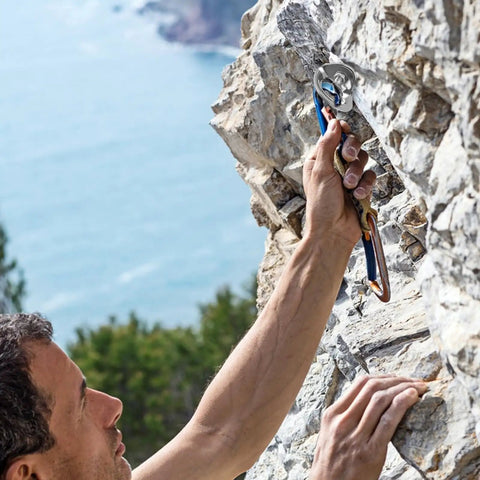 Bulletproof Stainless Steel Climbing Anchor Bolt Set Of 8 With 25KN Load Rating For Three Eighth Inch Bolts rigged on a rock face.