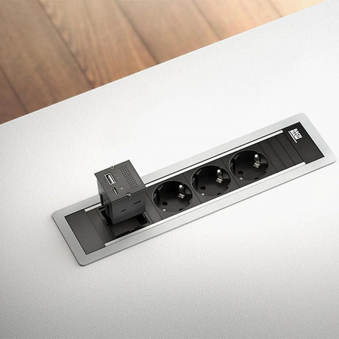 Sleek Black Portable Replikator Usb C Notebook All In One Laptop Featuring Plug And Play Connectivity And Snappy Processing Power For Your Daily Grind And Remote Hustle On The Road shown with a desktop power outlet.